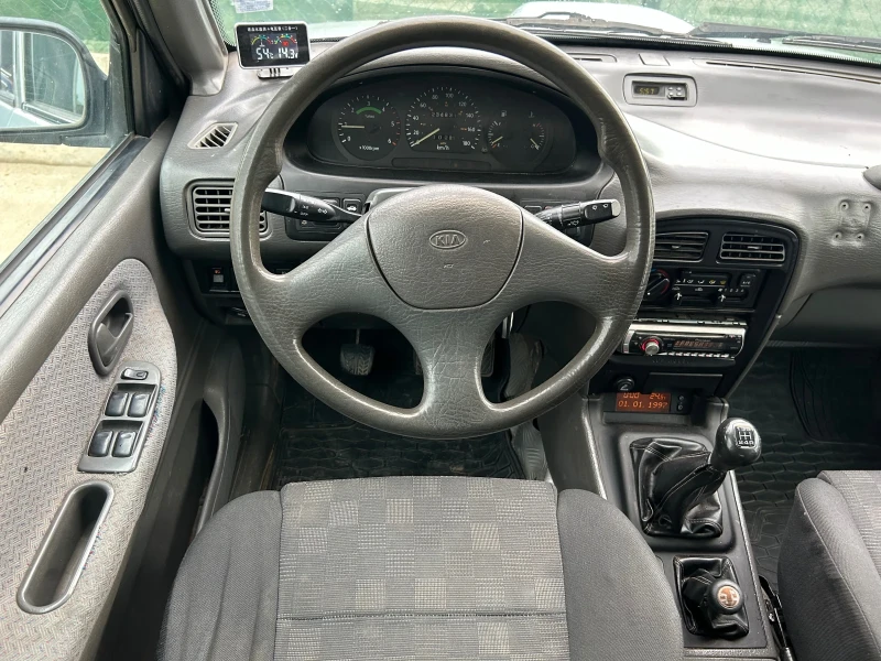 Kia Sportage 2.0 TD, снимка 14 - Автомобили и джипове - 47208724