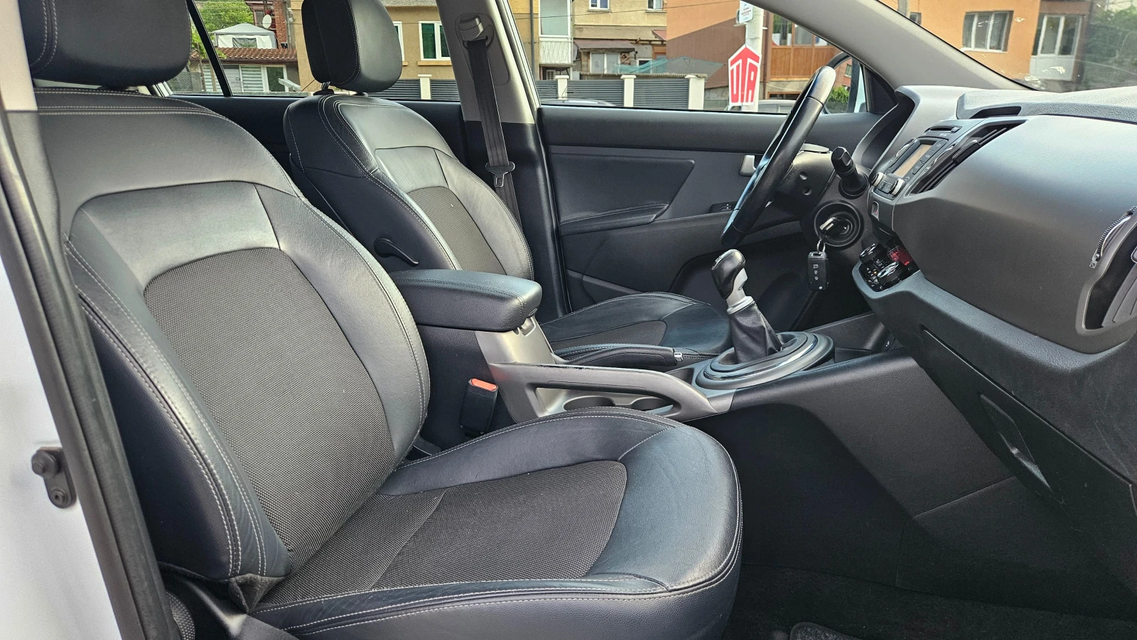 Kia Sportage 1.7 Crdi NAVIG/KOJA/KLIMA/6skorosti, снимка 12 - Автомобили и джипове - 55405496