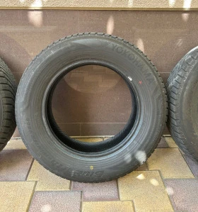 Гуми Зимни 195/65R15, снимка 1 - Гуми и джанти - 48278794