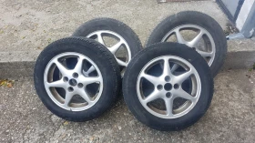 Гуми с джанти Pirelli 185/65R15, снимка 1