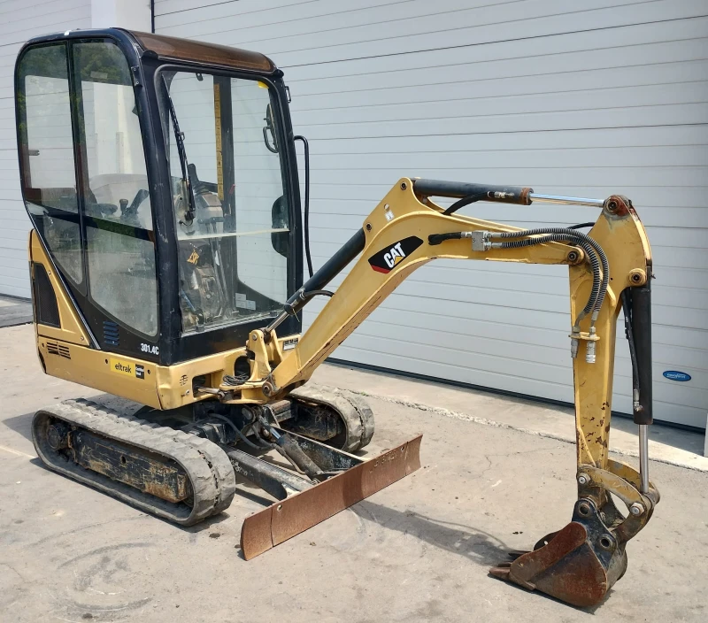 Багер Cat 301.4C