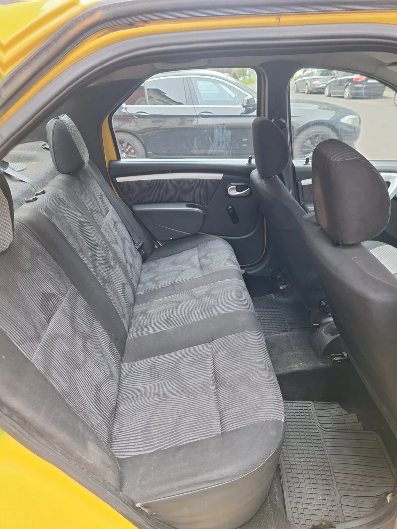 Dacia Logan, снимка 9 - Автомобили и джипове - 52636711