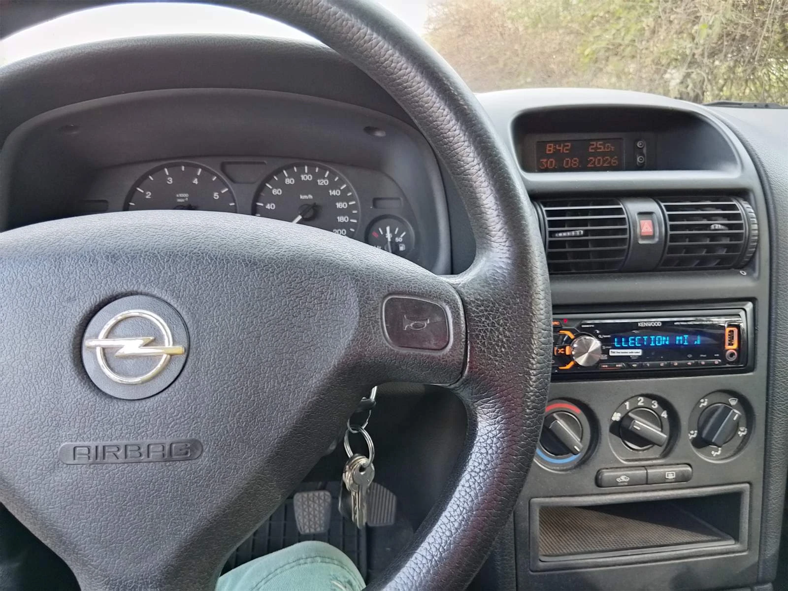 Opel Astra, снимка 7 - Автомобили и джипове - 56023602