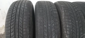 Гуми Зимни 215/65R17, снимка 7 - Гуми и джанти - 50699800
