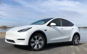     Tesla Model Y 0  ,  