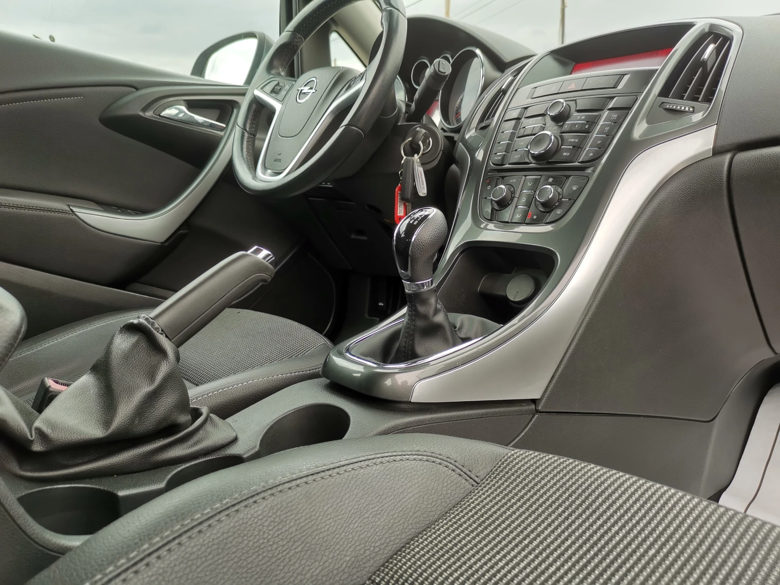Opel Astra 1.7CDTi FACE / Реални КМ / 1 СОБСТВЕНИК /БЕЗ РЪЖДА, снимка 14 - Автомобили и джипове - 55429914