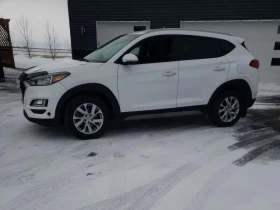 Hyundai Tucson AWD Preferred * ПОДГРЕВИ * CARFAX - 12900 € / 25230.21 лв. - 70230995 2