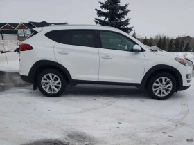 Hyundai Tucson AWD Preferred * ПОДГРЕВИ * CARFAX - 12900 € / 25230.21 лв. - 70230995 3