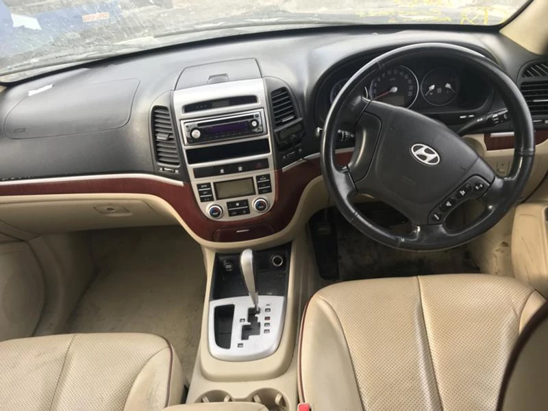 Hyundai Santa fe 2.2d Кожа автомат, снимка 11 - Автомобили и джипове - 20515123