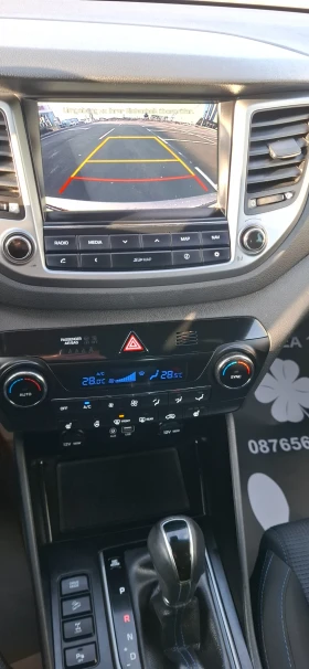 Hyundai Tucson 2.0 crdi 4x4 136 LED Automat , снимка 14