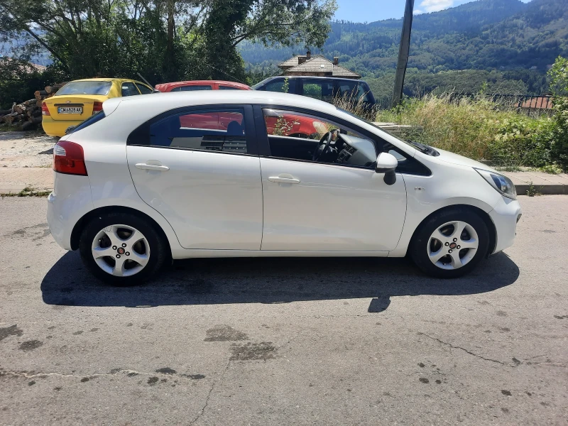 Kia Rio 1.25 бензин + ГАЗ, снимка 5 - Автомобили и джипове - 46683518