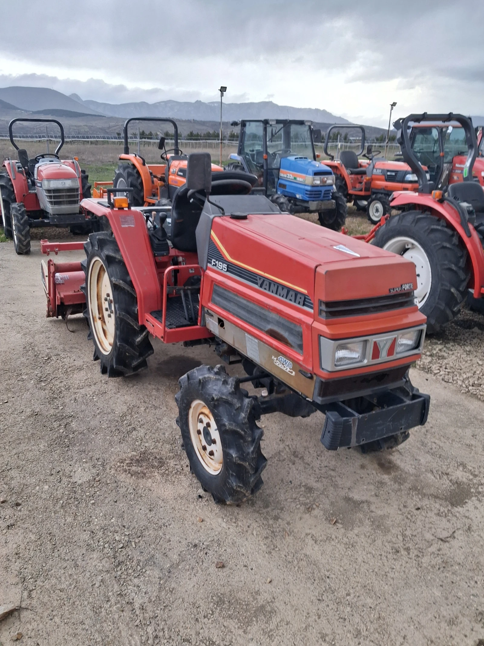 Трактор Kubota скайтрак 