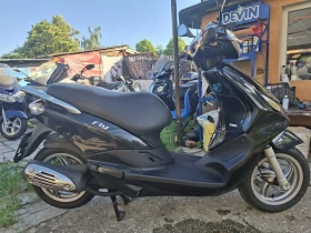 Piaggio Fly 125i  Става за А1 много лек пъргав и икономичен | Auto.bg — изображение 3