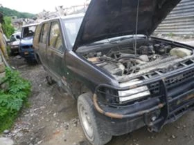 Opel Frontera A 2.2i, 2.3TD, снимка 13