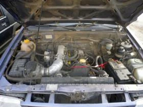 Opel Frontera A 2.2i, 2.3TD, снимка 14