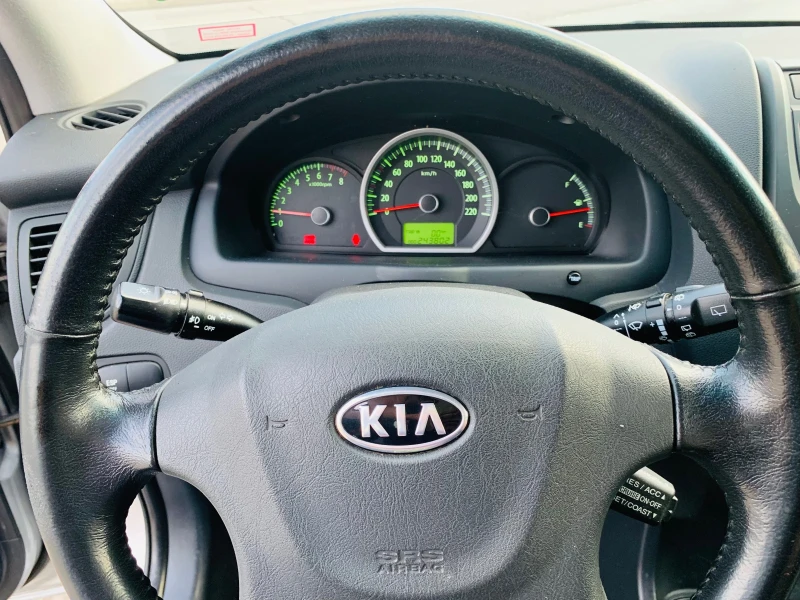 Kia Sportage 2.0i GPL, снимка 11 - Автомобили и джипове - 47008385