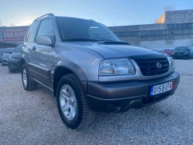     Suzuki Grand vitara 2.0 , 120000 .