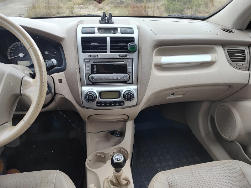 Kia Sportage 2.0 LPG 4x4, снимка 6 - Автомобили и джипове - 52774659