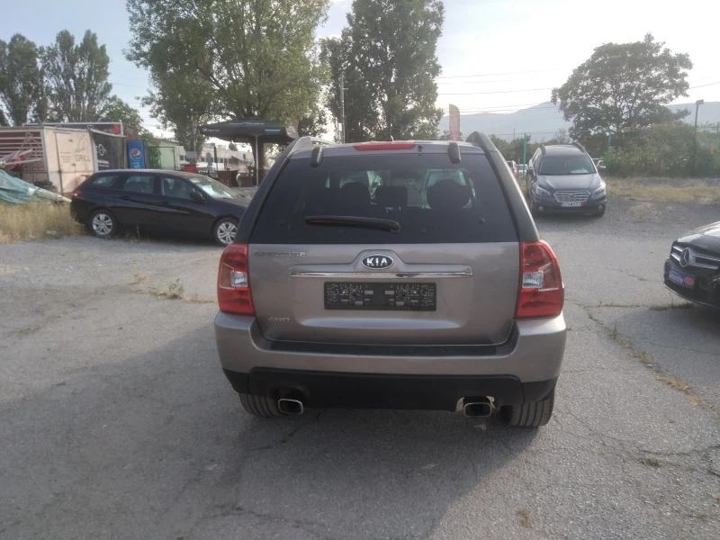 Kia Sportage 2.0i  141кс.4х4, снимка 6 - Автомобили и джипове - 47637327