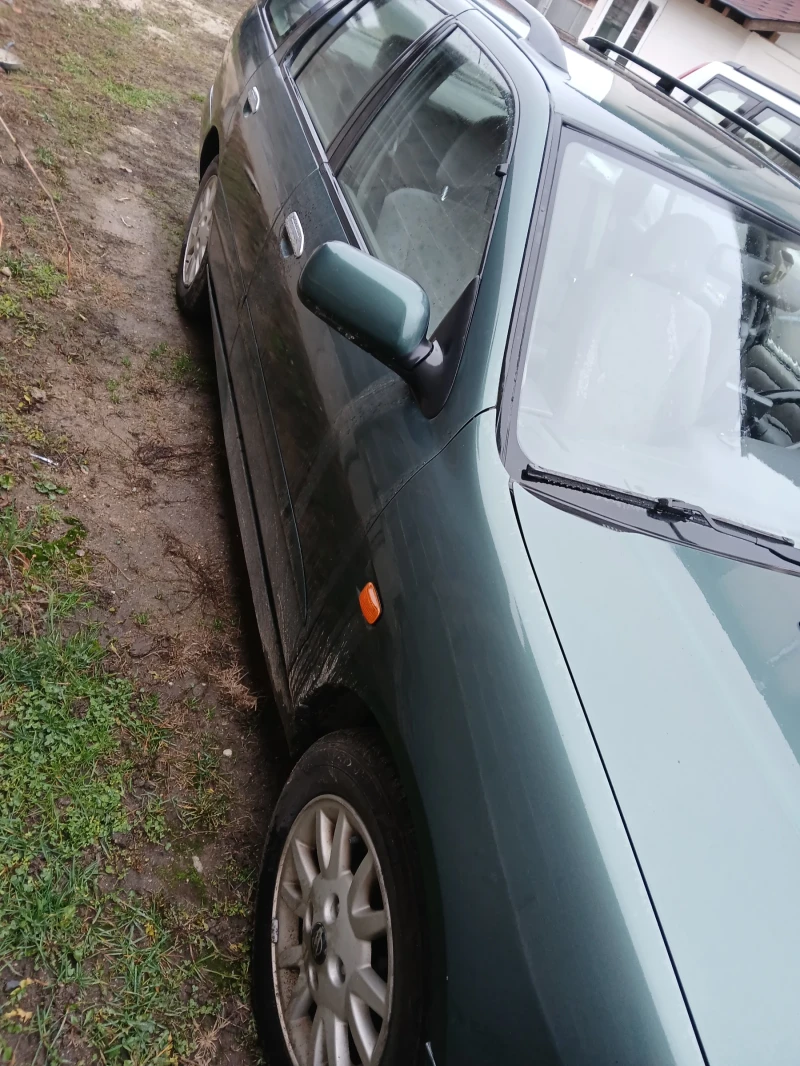 Nissan Primera, снимка 12 - Автомобили и джипове - 48654941