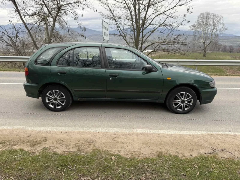 Nissan Almera 1.4 Бензин, снимка 7 - Автомобили и джипове - 52979056