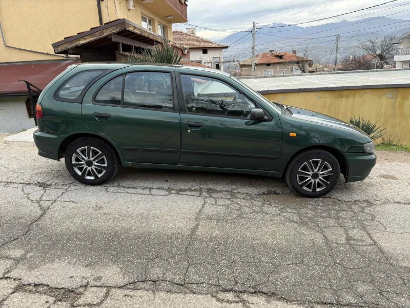 Nissan Almera 1.4 Бензин, снимка 15 - Автомобили и джипове - 52979056