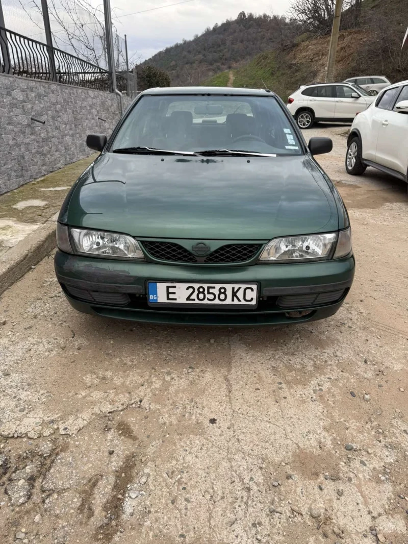Nissan Almera 1.4 Бензин, снимка 13 - Автомобили и джипове - 52979056