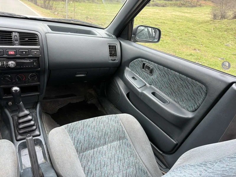 Nissan Almera 1.4 Бензин, снимка 10 - Автомобили и джипове - 52979056