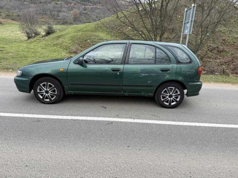 Nissan Almera 1.4 Бензин, снимка 6 - Автомобили и джипове - 52979056
