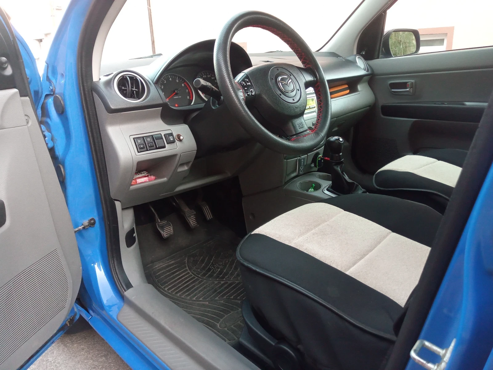 Mazda 2 1, 25 - изображение 8