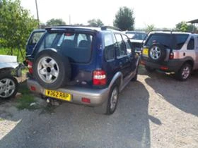 Kia Sportage 2.0 I, 128 k.с., снимка 2