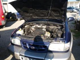 Kia Sportage 2.0 I, 128 k.с., снимка 4