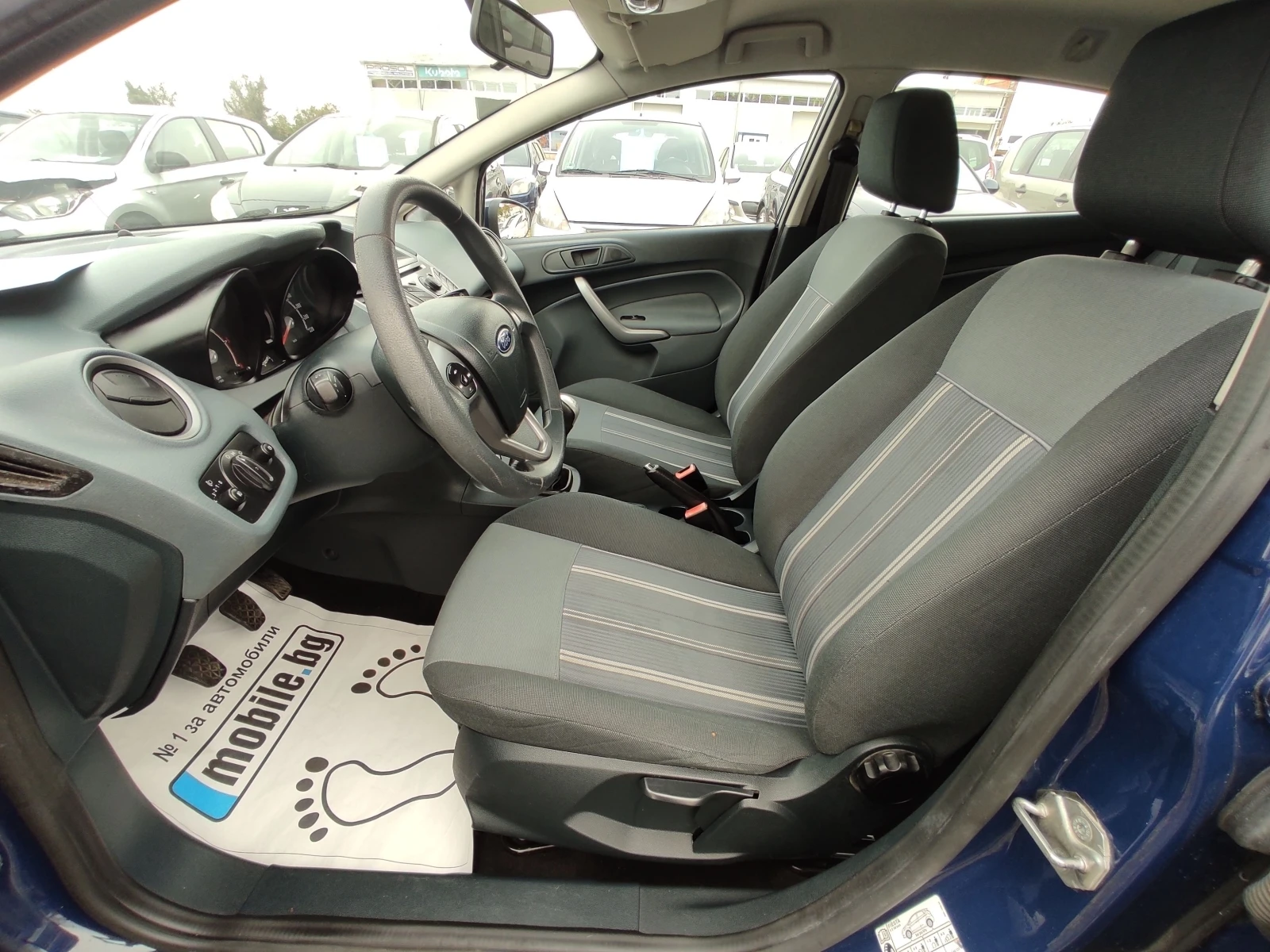 Ford Fiesta 1.4HDi/КЛИМАТРОНИК/70к.с - изображение 9