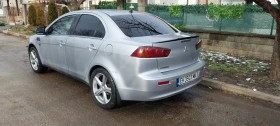 Mitsubishi Lancer 1.5 - 4000 € / 7823.32 лв. - 84289362 6