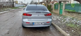 Mitsubishi Lancer 1.5 - 4000 € / 7823.32 лв. - 84289362 4