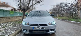 Mitsubishi Lancer 1.5 - 4000 € / 7823.32 лв. - 84289362 2