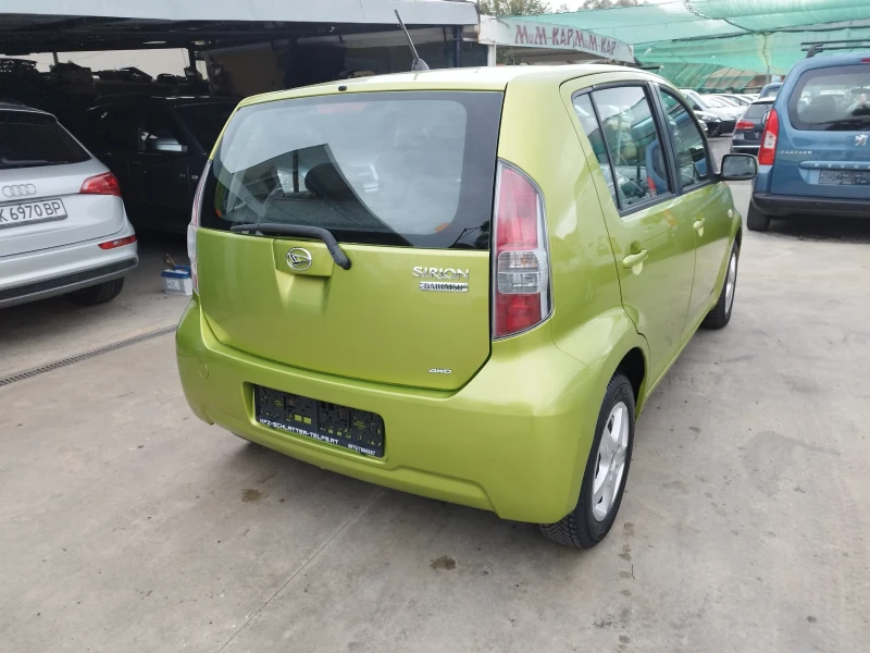 Daihatsu Sirion 1.3i 4х4, снимка 4 - Автомобили и джипове - 47464749