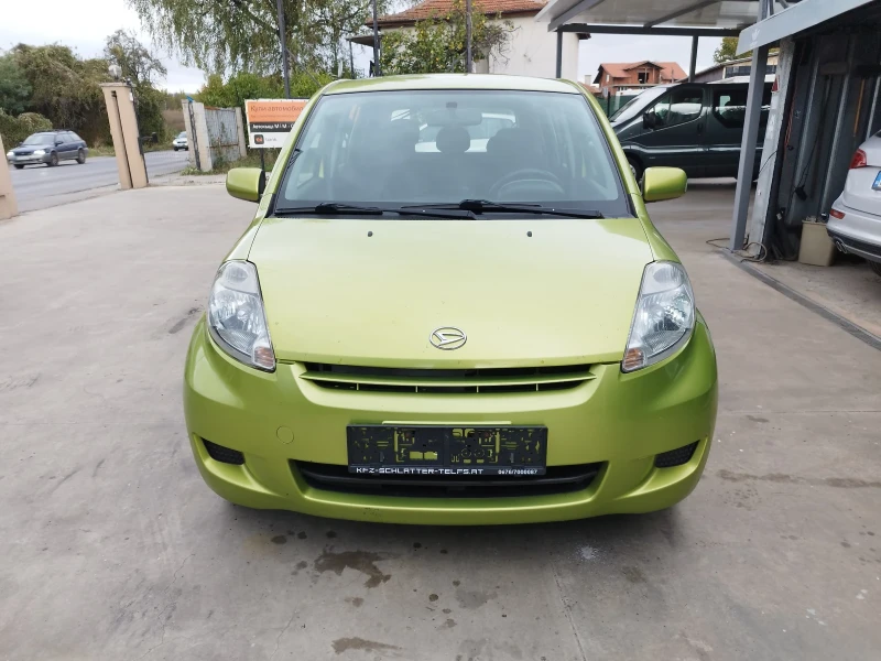 Daihatsu Sirion 1.3i 4х4, снимка 14 - Автомобили и джипове - 47464749