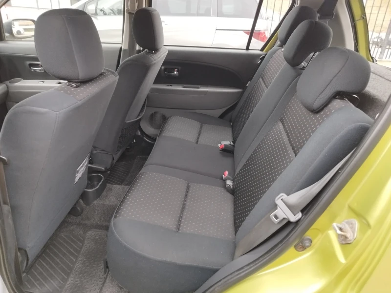 Daihatsu Sirion 1.3i 4х4, снимка 10 - Автомобили и джипове - 47464749