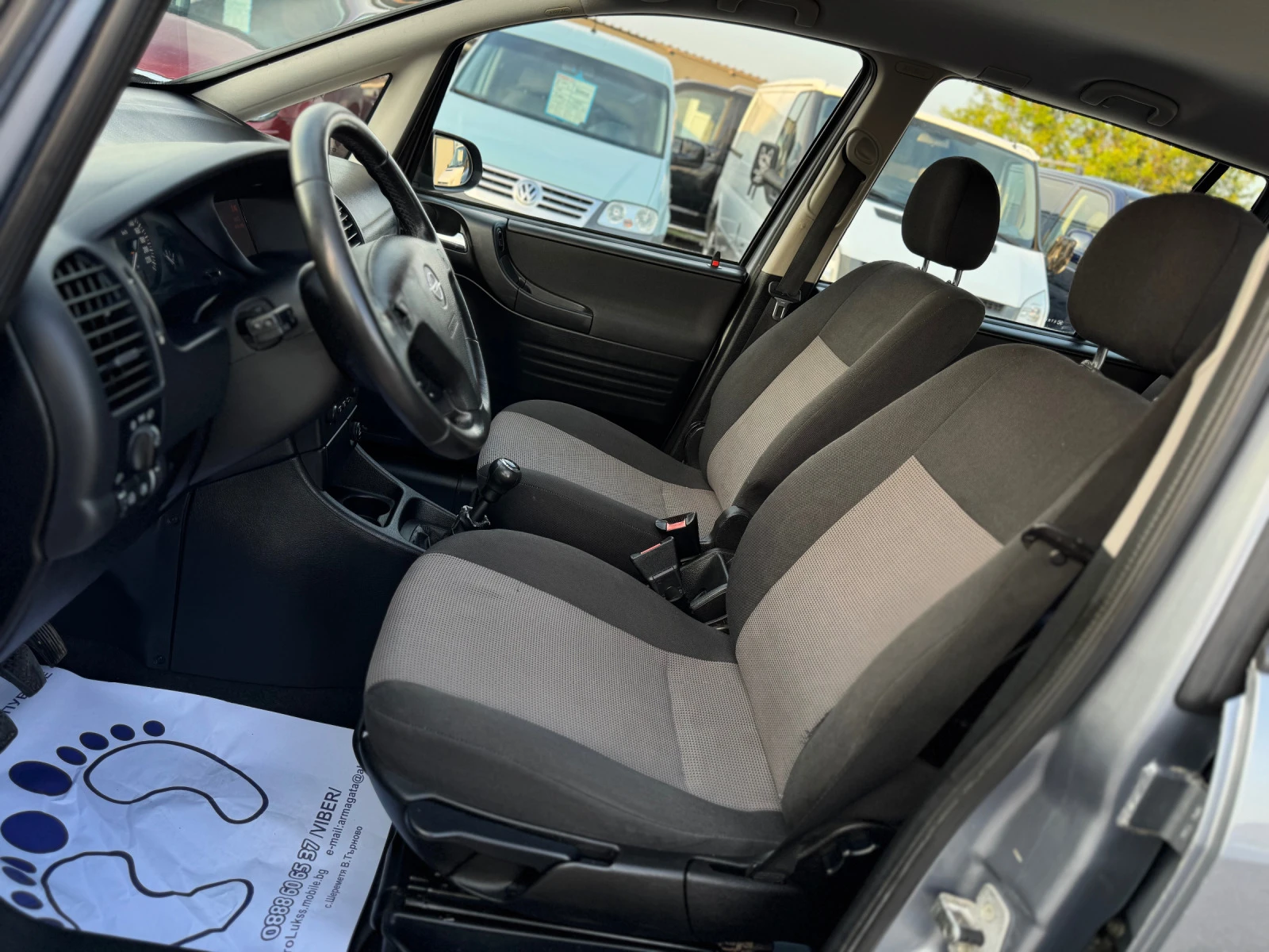 Opel Zafira 1.6i 101кс 7-места КЛИМАТРОНИК НАВИГАЦИЯ  | Mobile.bg — изображение 11