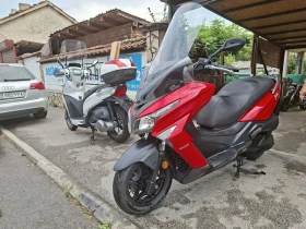 ������ Kymco Downtown