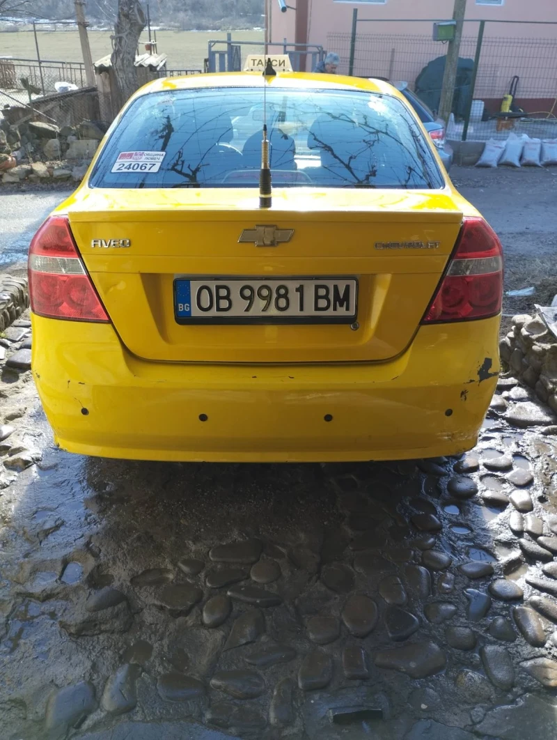 Chevrolet Aveo, снимка 11 - Автомобили и джипове - 48633946