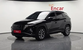 Hyundai Tucson Hybrid (NX4) Premium, снимка 1