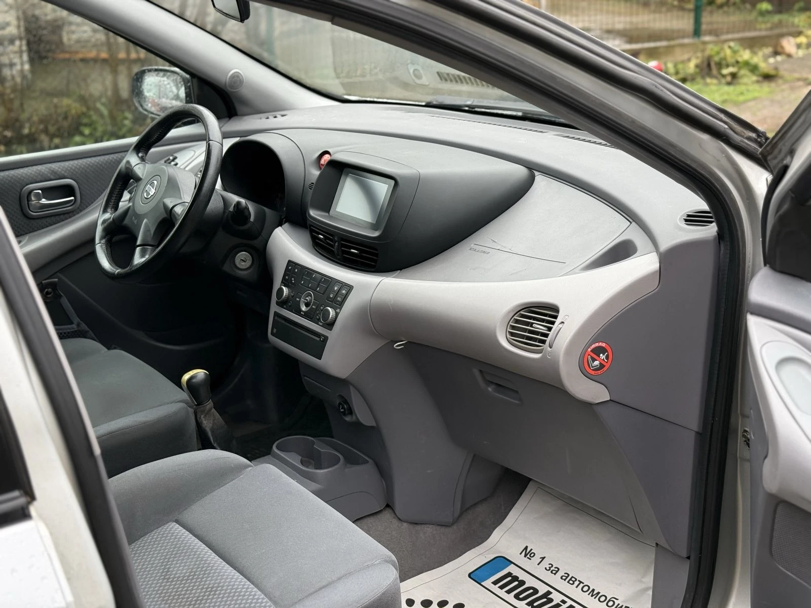 Nissan Almera tino  - изображение 5