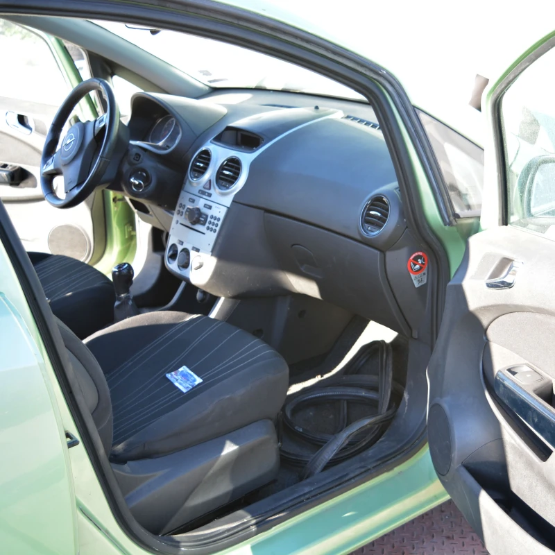 Opel Corsa 1.2 i, снимка 7 - Автомобили и джипове - 47890006