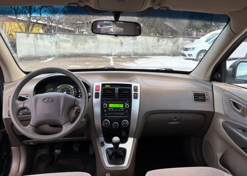 Hyundai Tucson 2.0lpg 141hp 4x4, снимка 11 - Автомобили и джипове - 48451082