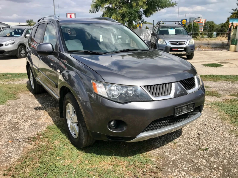 Mitsubishi Outlander 2.4i-AUTOM.4x4, снимка 2 - Автомобили и джипове - 47012465