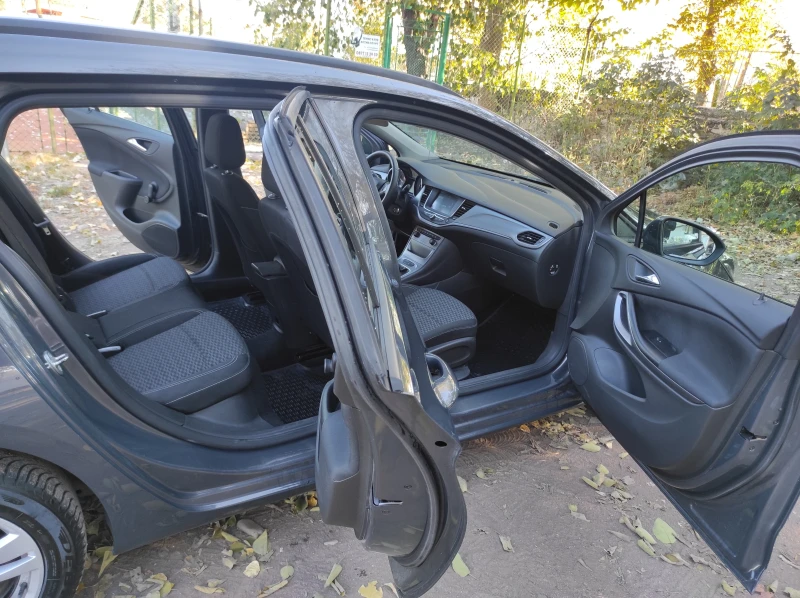 Opel Astra 1.6TDCI 95кс, снимка 15 - Автомобили и джипове - 48084134