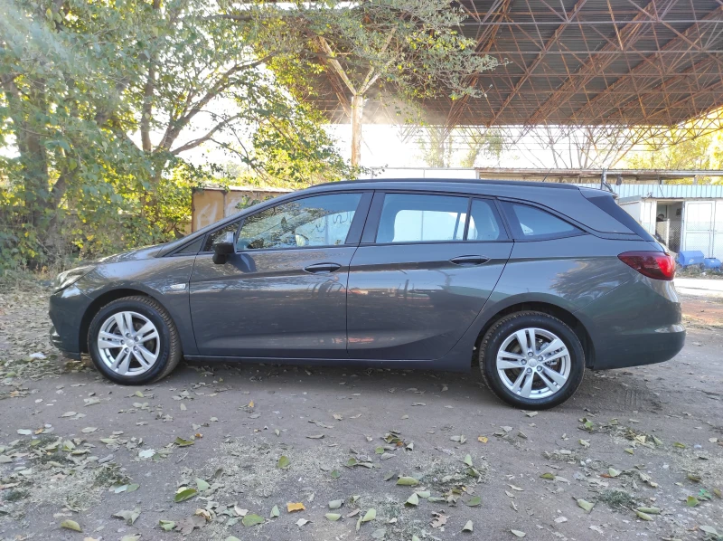 Opel Astra 1.6TDCI 95кс, снимка 8 - Автомобили и джипове - 48084134