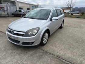 Opel Astra 1.9cdti 150кс 210000км, снимка 2